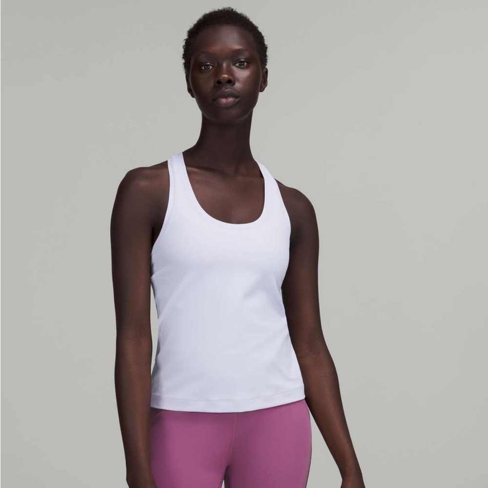 White lulu tank. Worn a few times good condition
